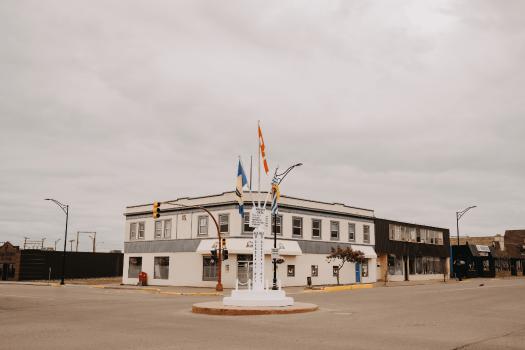 Photo of the Mile 0 Post in downtown Dawson Creek